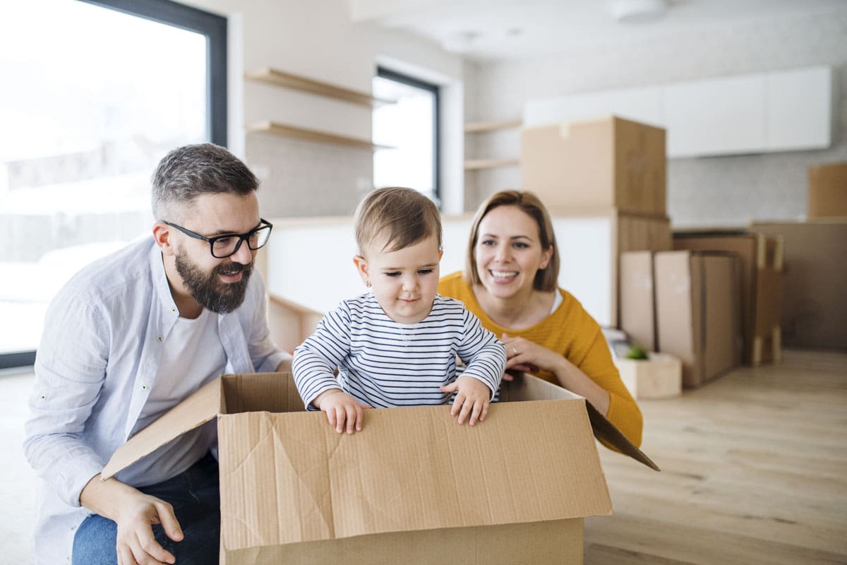 Family unpacking in a new home