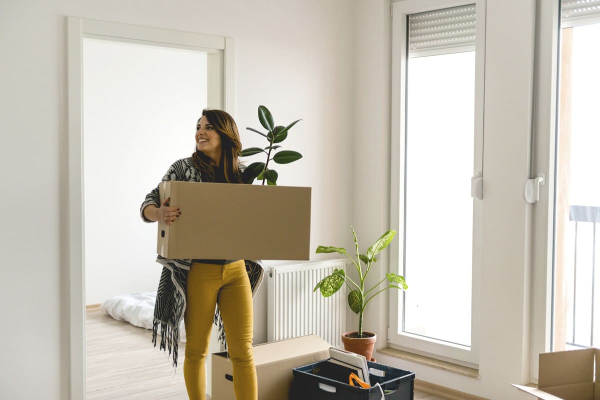 Woman moving into a new space